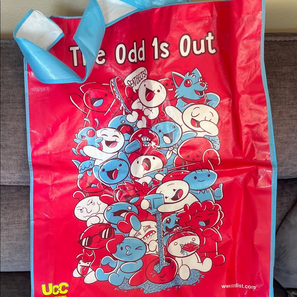 EUC large, reusable tote bag featuring a collage of “The Odd 1s Out".